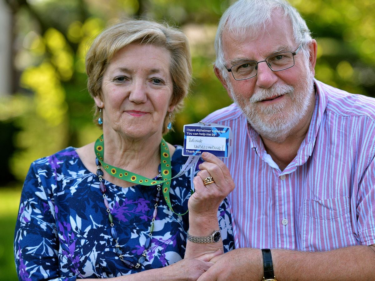 Alzheimer's sufferer Cheryl Hayes, 67, with husband David. She wears a lanyard to let other people know about her disability.