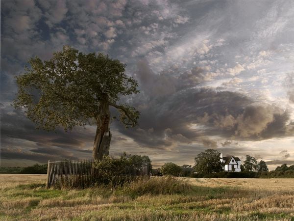 The Royal Oak and Boscobel House with a dramatic sky.