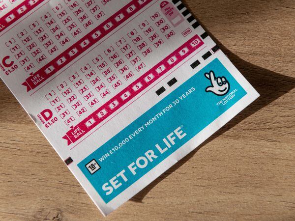 Close-up of a National Lottery Set For Life playing coupon