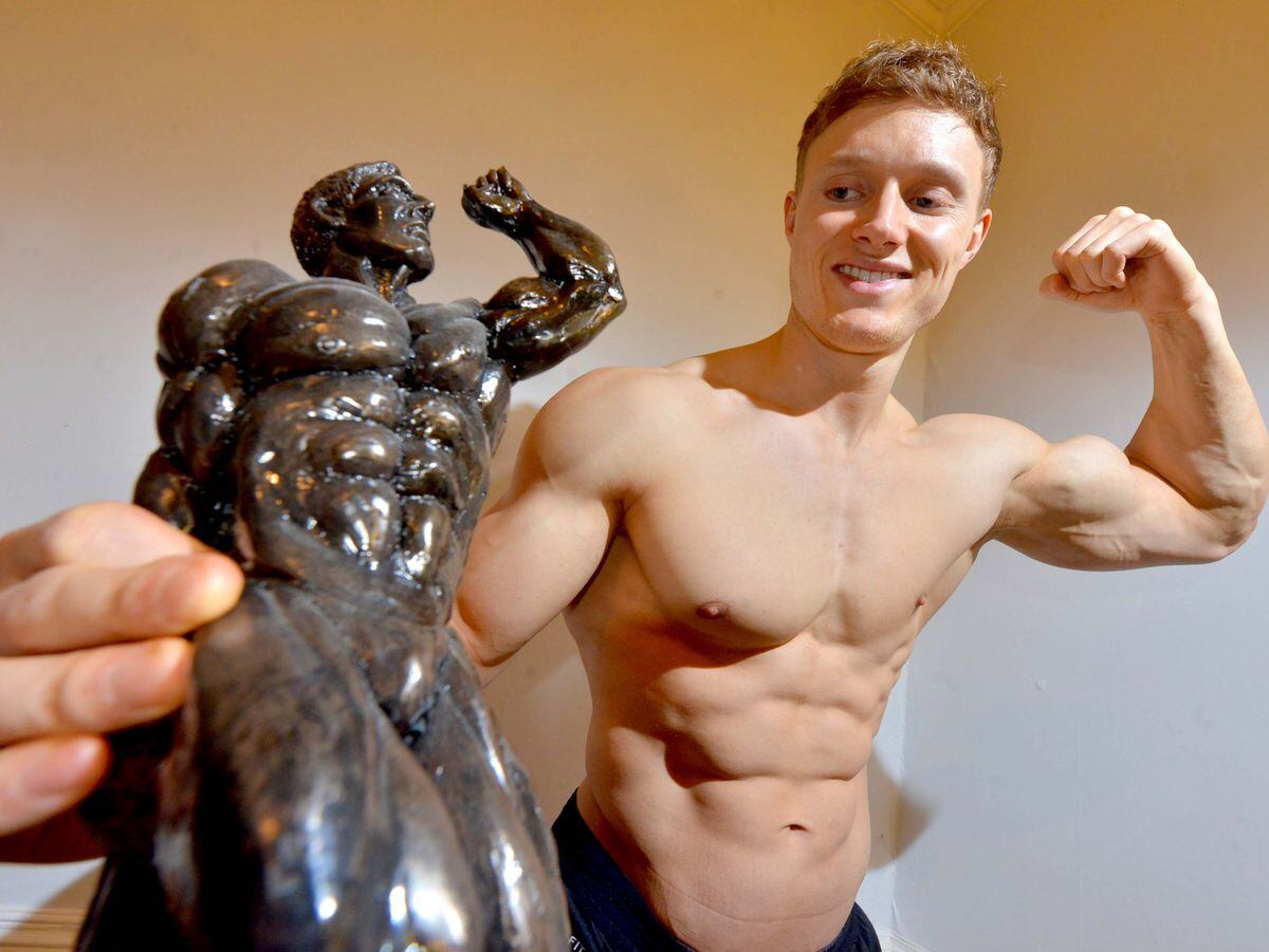 SHREW COPYRIGHT SHROPSHIRE STAR STEVE LEATH 07/11/2018..Pics in Shrewsbury of Charlie Brisbourne 27, off to Miami to compete in the DFAC World Championship Bodybuilding Competition. Pictured with a pervious comp trophy..
