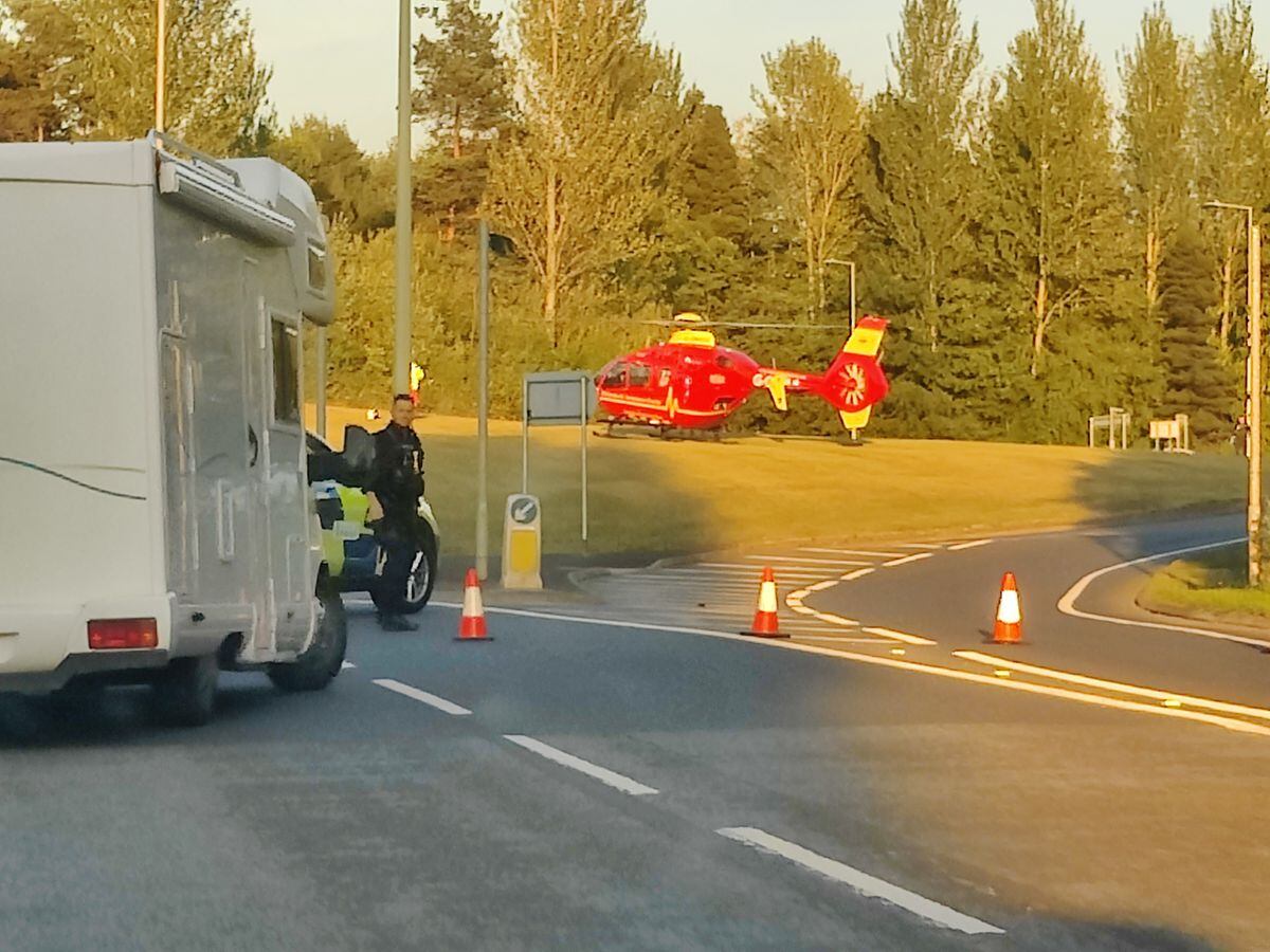 An air ambulance on the island at the Old Park Roundabout