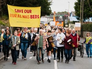 Campaigners and residents have marched in Bishop's Castle calling for health bosses to re-open inpatient beds at their hospital.