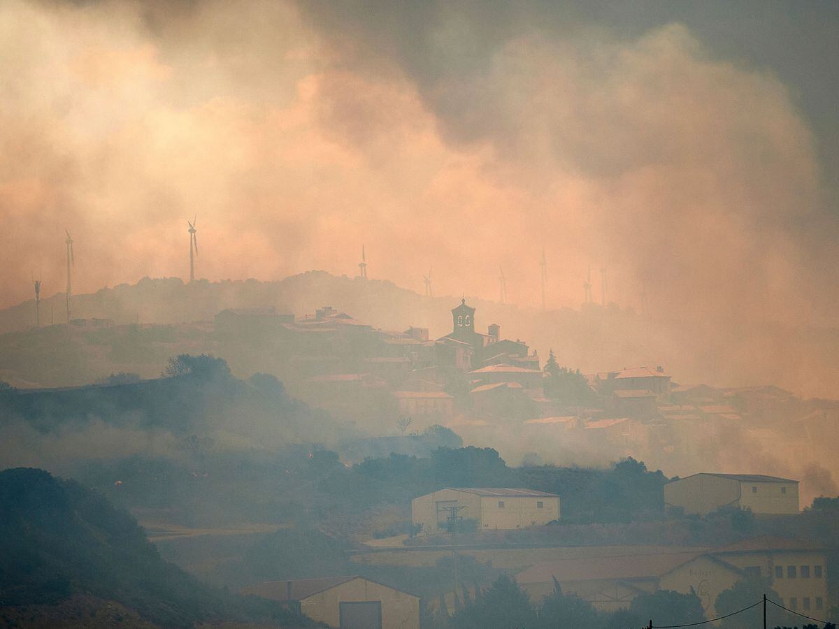 Smoke rises over San Martin de Unx in northern Spain