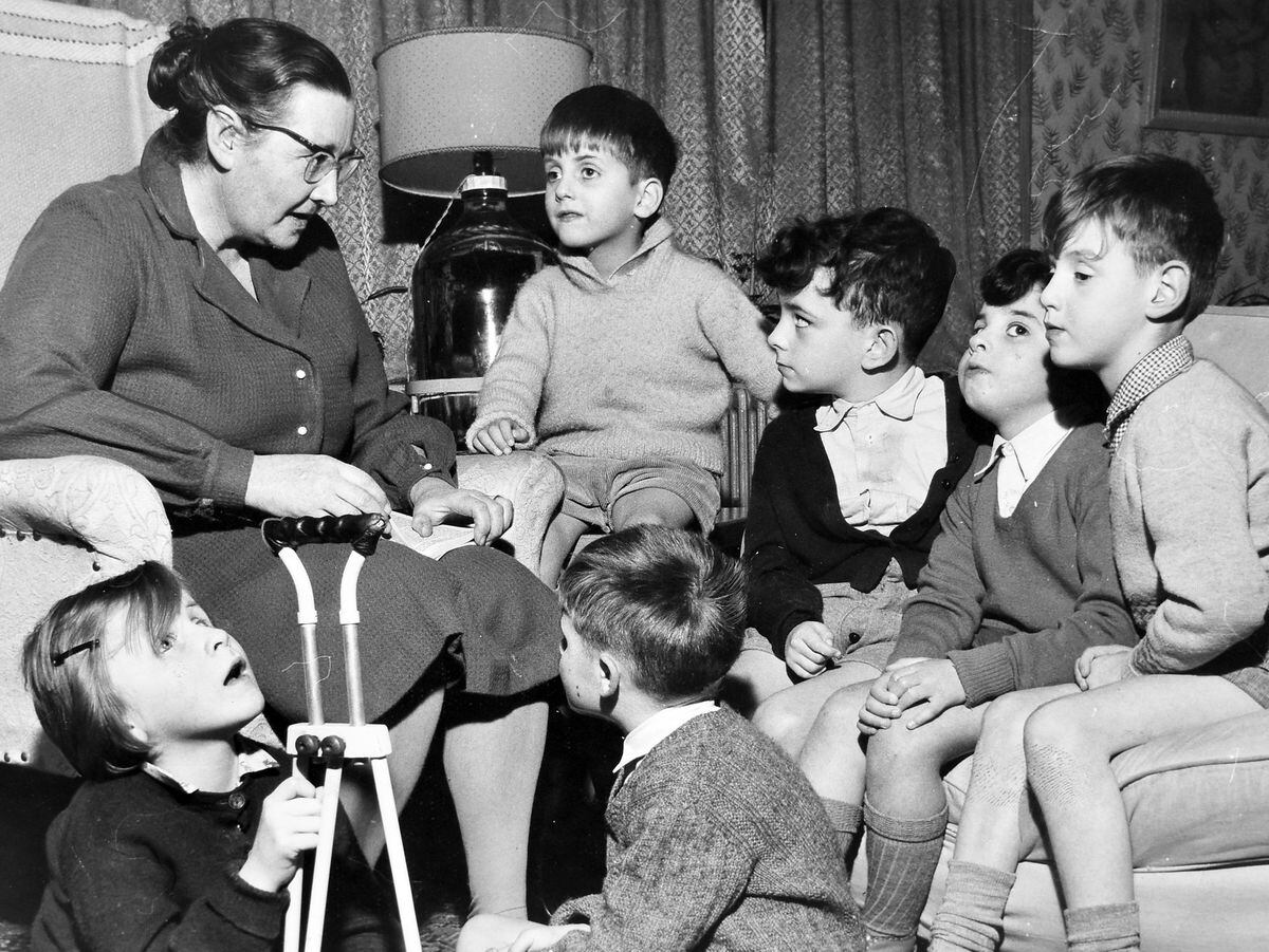 Story time with Miss Lunt at Overley Hall in November 1961.