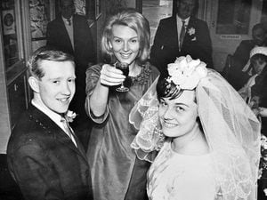 Broseley singer Janie Marden raises a glass to the wedded couple after making the dash to Shropshire for the Hadley marriage in March 1965 of her cousin Diane Garbett and Clifford Biddulph.