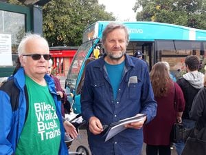 Alan Cartwright and John Hargreaves of the transport branch of Market Drayton Climate Action. Pictured carrying out the bus survey