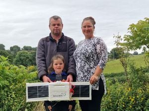 Allen and Charlotte Buckley with daughter, five year old Lily and the balloon's payload 
