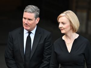 Labour leader Sir Keir Starmer and Prime Minister Liz Truss leave Westminster Hall, London