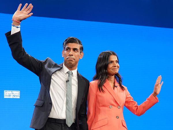 Prime Minister Rishi Sunak and his wife Akshata Murty on stage after he delivered his keynote speech