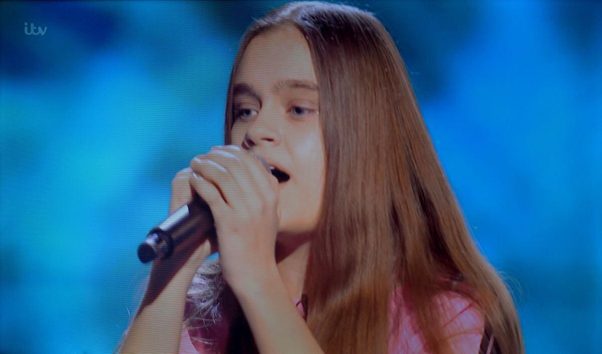 Becky performing on The Voice Kids