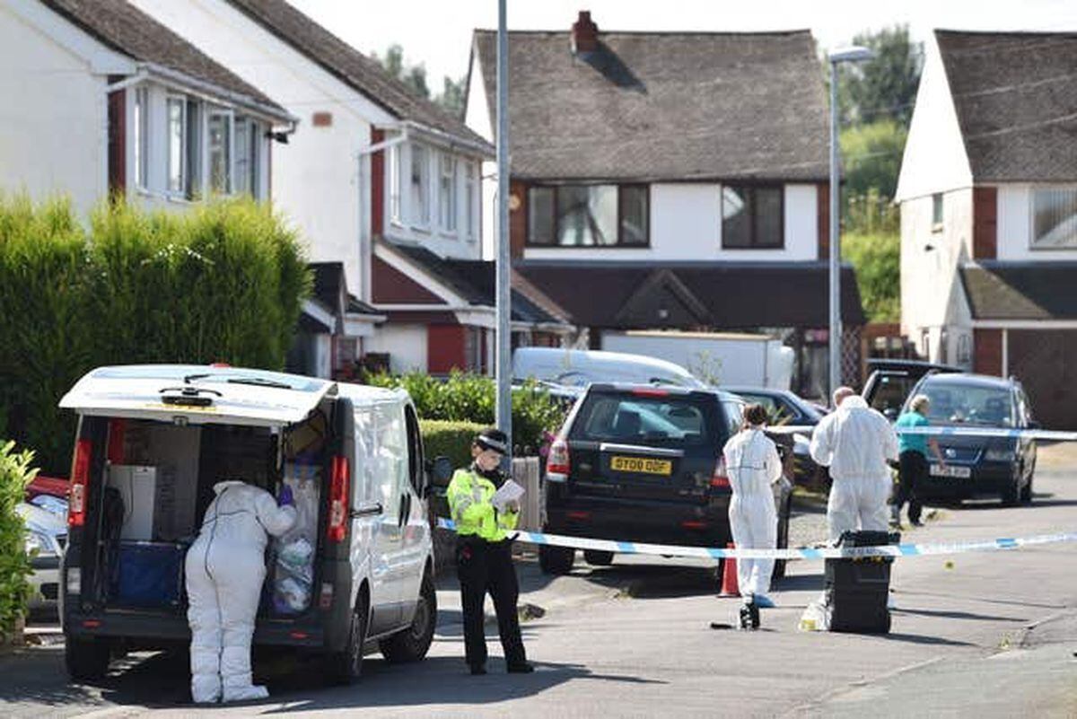 Forensic teams at the scene in Meadow Close, Telford, in August 2016