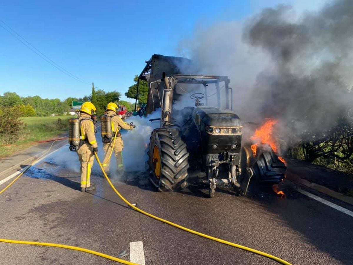 Firefighters fight the tractor blaze on the A41. Photo: Market Drayton Fire Station