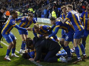 Ryan Bowman of Shrewsbury Town celebrates with his team mates after scoring a goal to make it 2-1..