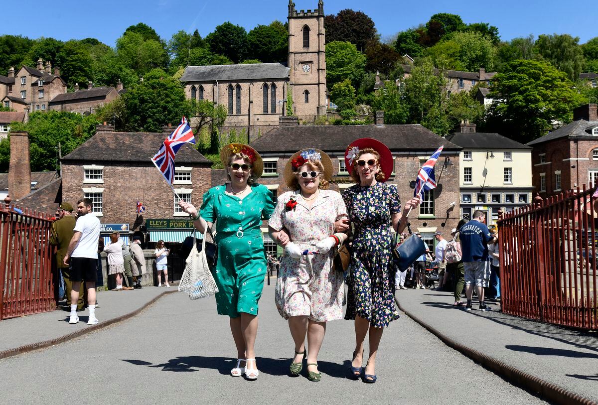 The Ironbridge World War Two Weekend. Sisters dressed in 1940s style walking over the world's first Ironbridge. Picture: Dave Bagnall