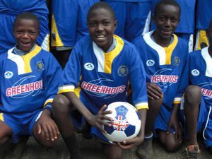 African youngsters donning donated football kits from Shrewsbury Town