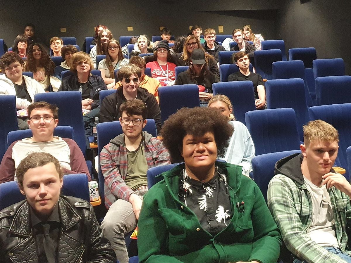 Telford College creative media students at Wellington Orbit, watching their work on the big screen