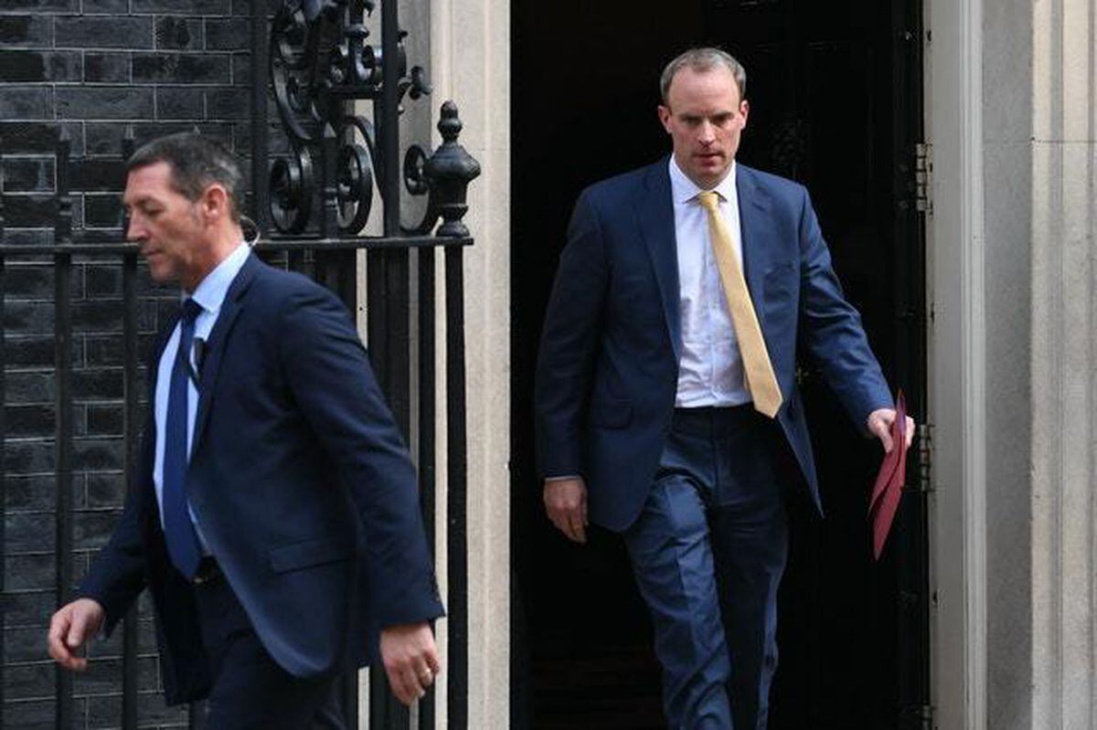 Foreign Secretary Dominic Raab leaving 10 Downing Street, London, as Prime Minister Boris Johnson remains in hospital following his admission on Sunday with continuing coronavirus symptoms (Stefan Rousseau/PA)
