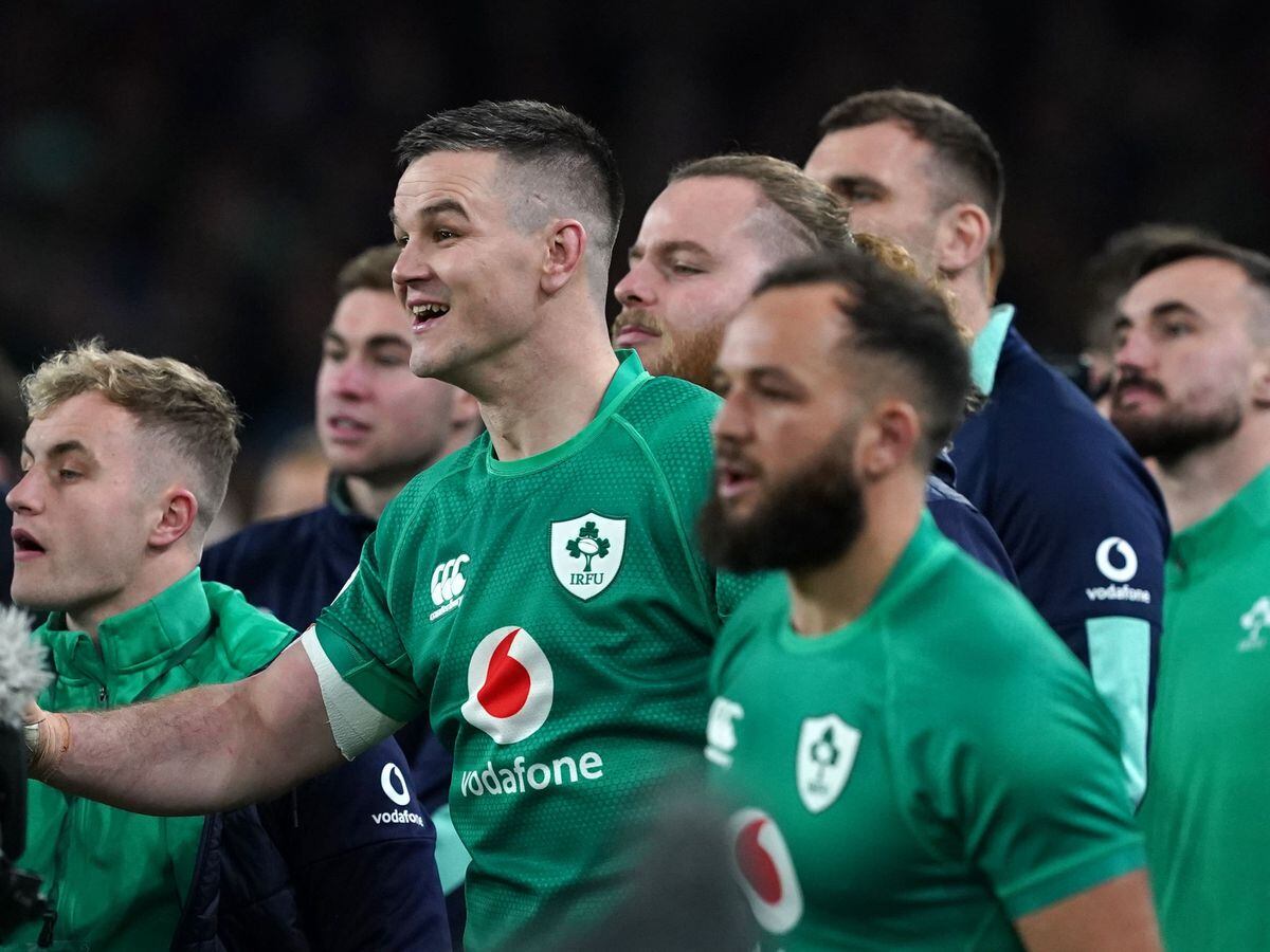 Johnny Sexton, centre, and Ireland celebrate after beating England
