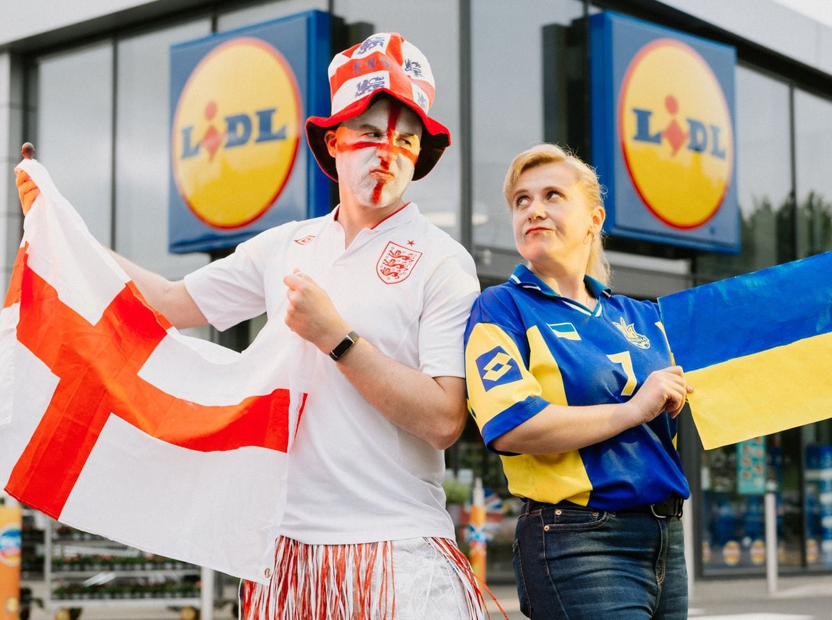 Lidl Madeley store manager Stuart Morris and his deputy Lyuda Alcock ahead of the England vs Ukraine