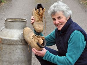 Helen Francis with the milk churn that received donations at the first Trefonen Hill Walk 