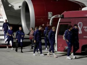 Members of England's national soccer team arrive at Hamad International Airport in Doha, Qatar, Tuesday, Nov. 15, 2022, ahead of the upcoming World Cup. England will play their first match in the World Cup against Iran on Nov. 21. (AP Photo/Hassan Ammar).