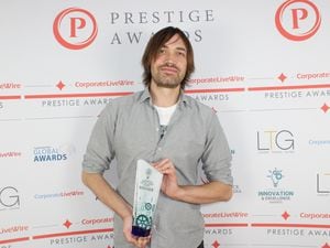 3D designer and printer Oliver Landau-Williams with his award 