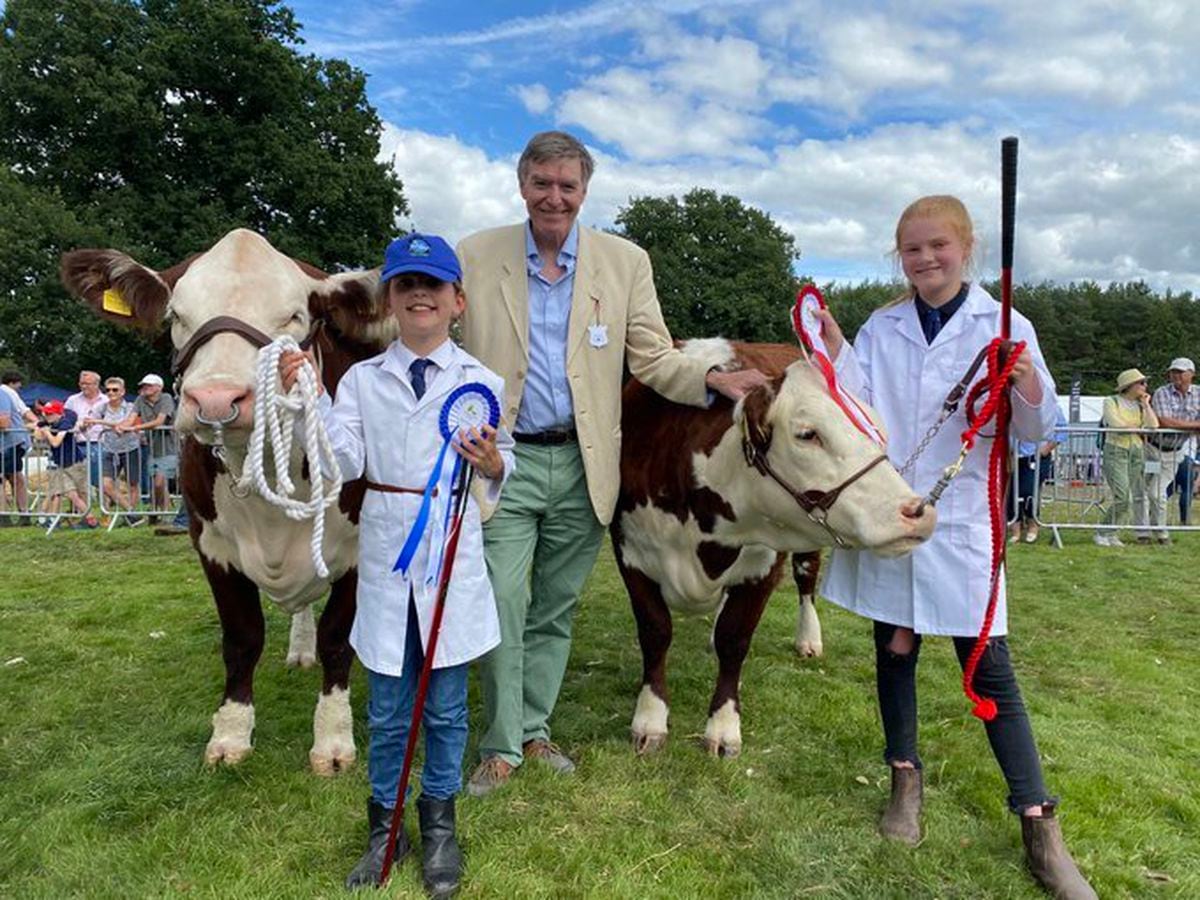 Ludlow MP Philip Dunne with Ashlee Hughes and Mia Shaw ⁦