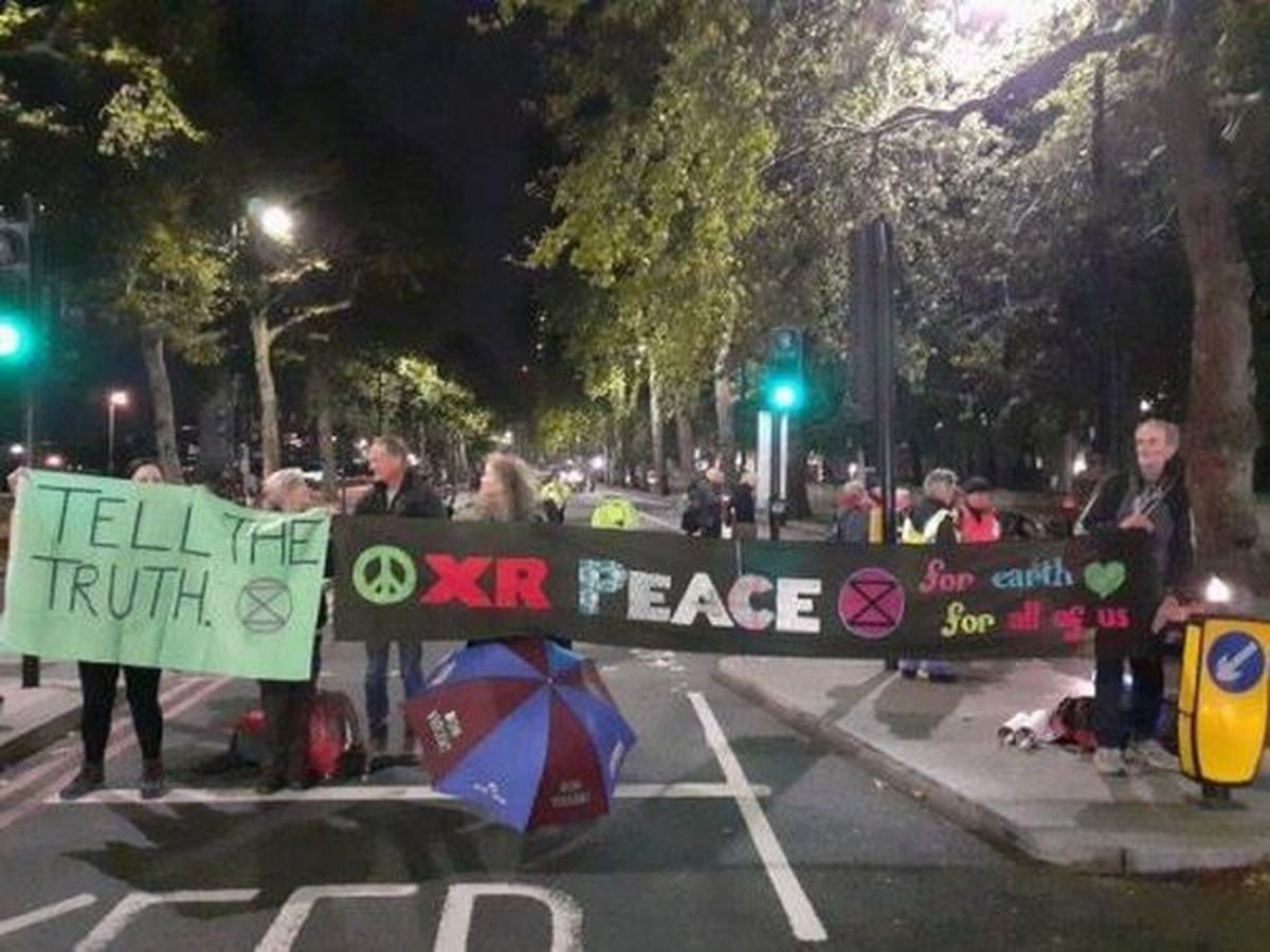Protesters from Shrewsbury block the road outside the Ministry of Defence