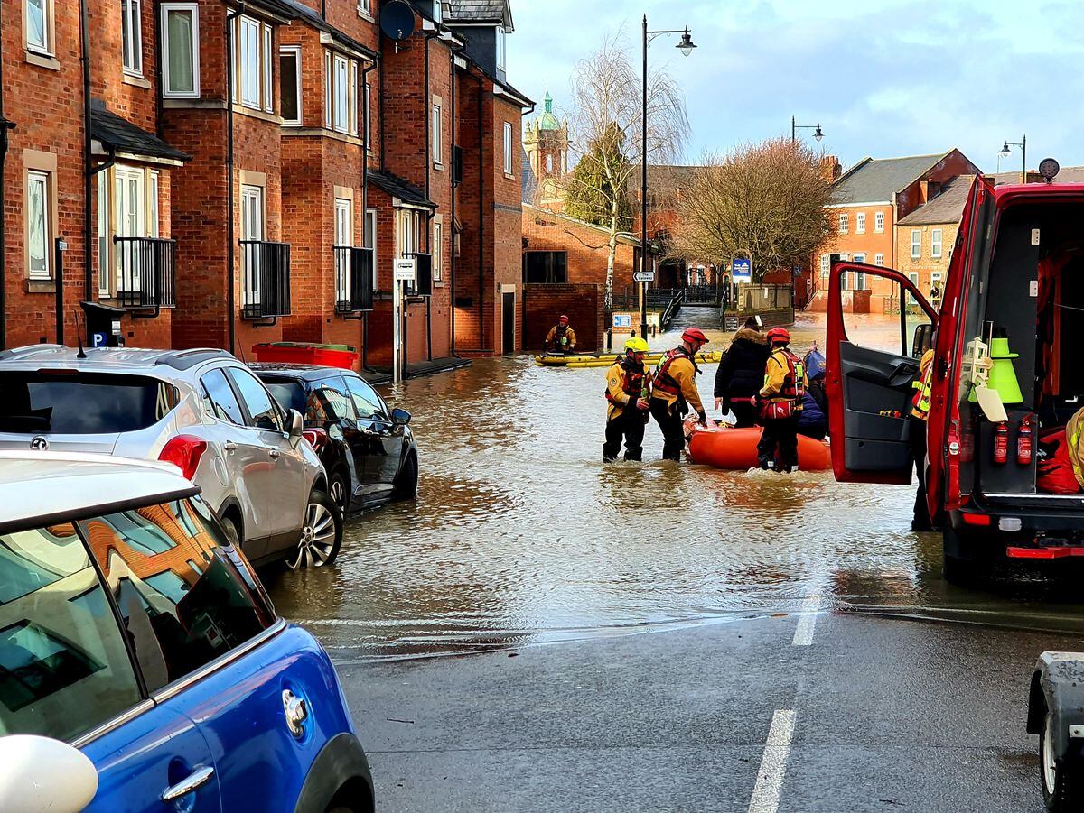 A boat rescue team in Chester Street, Shrewsbury. Pic: Owain Betts