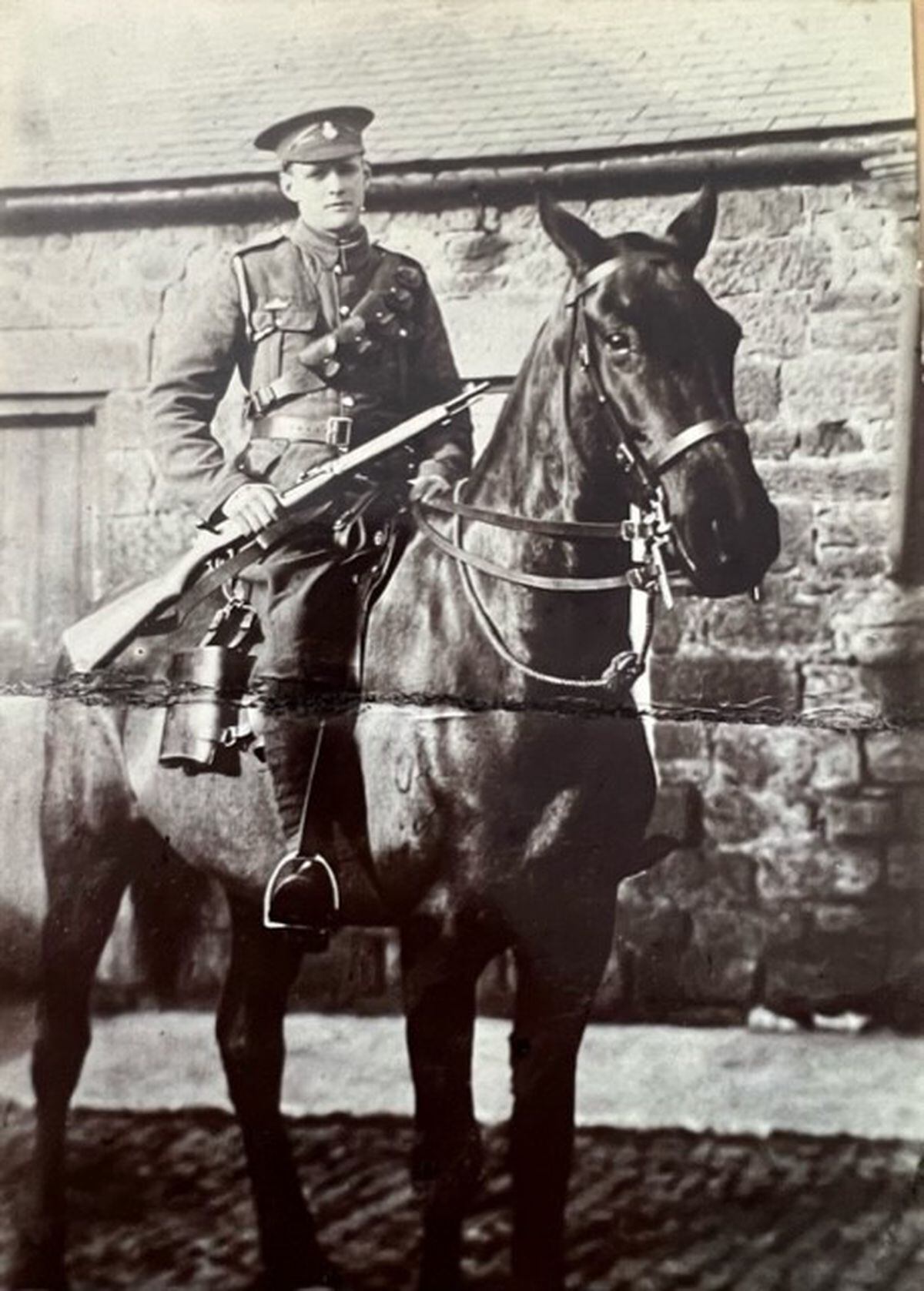 Jack Whittingham dressed in uniform on his horse