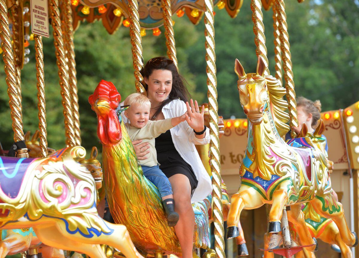 Enjoying themselves on a ride are LJ Mitchell and Harrison Mitchell, aged 2