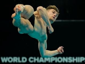 Jack Laugher of Great Britain competes during the men's diving 3m springboard final at the 19th FINA World Championships in Budapest, Hungary, Tuesday, June 28, 2022. (AP Photo/Petr David Josek).