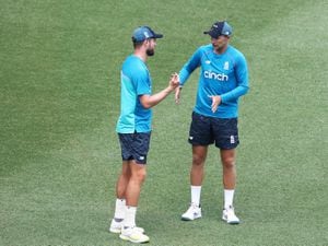 England's Joe Root ( Right ) talks with Chris Woakes             