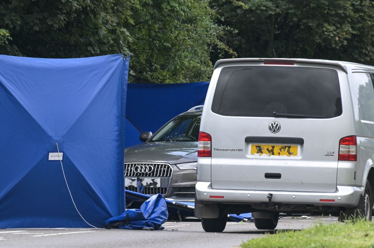 An unmarked police car was behind the cordon as investigators examined the scene. Photo: SnapperSK
