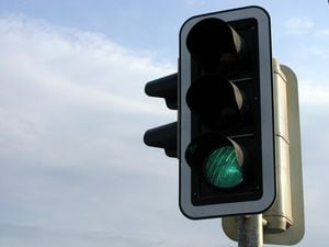 A generic photo of traffic lights.