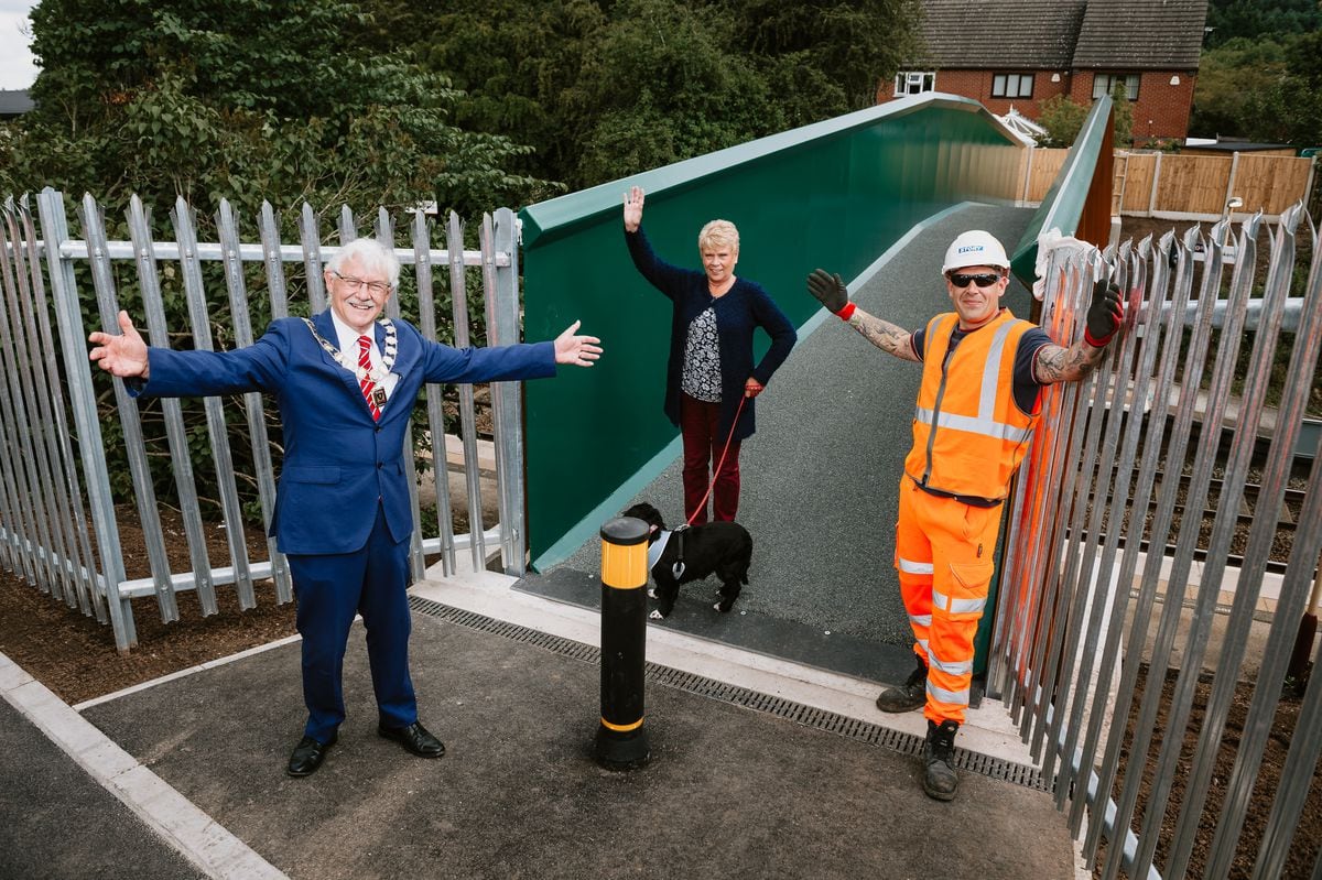 Oakengates Mayor Stephen Reynolds, resident Susan Cotton and site manager Leon Yewdell at the bridge