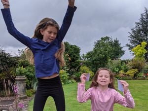 Ten-year-old Sophie Dahn and her six-year-old sister Lucy jumping for joy when they heard they were amongst the winners of Newport Rotary Lite's Spot the Oddity competition
