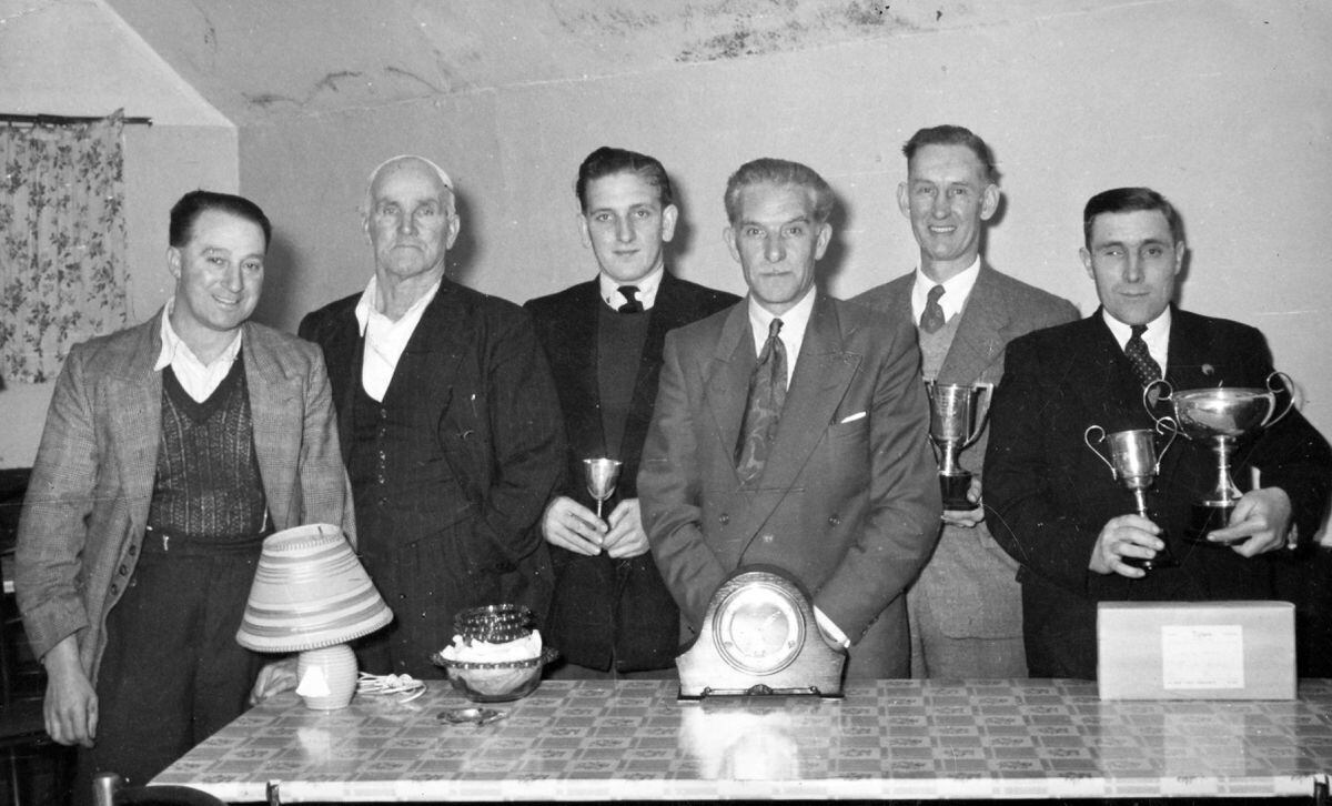 Lionel, second from right, with fellow pigeon racers from the Bridgnorth area. Phyl and her sister Elaine can partly identify some of the others. Third from right is Mr Holloway – Elaine thinks his full name might be Stan Holloway – who had a hairdressing business called Retonax in High Town and Low Town. The man far right had only one eye and drove a bus. Third from left is Ken Knowles from Alveley, and the surname of the person second from left is thought to be Delo. The picture is undated.