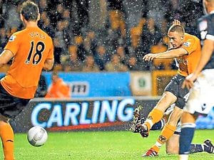 James Spray fires at goal in his first team debut for Wolves after coming off the bench to score against Millwall at Molineux