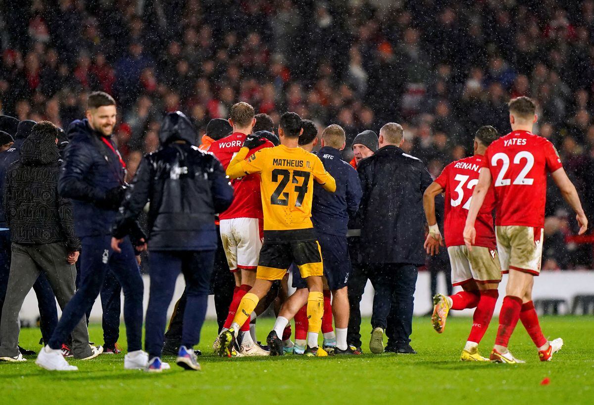 Tempers flare between players following the penalty shoot-out. Picture: Tim Goode/PA Wire.