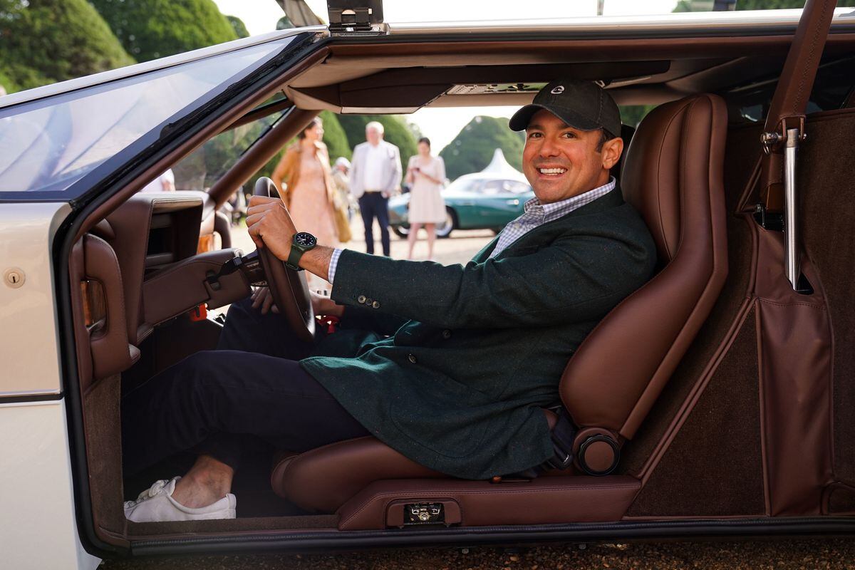 Owner Phillip Sarofim sits in the Aston Martin Bulldog