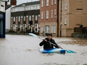 A canoeist took to the water in flooded Coleham, Shrewsbury