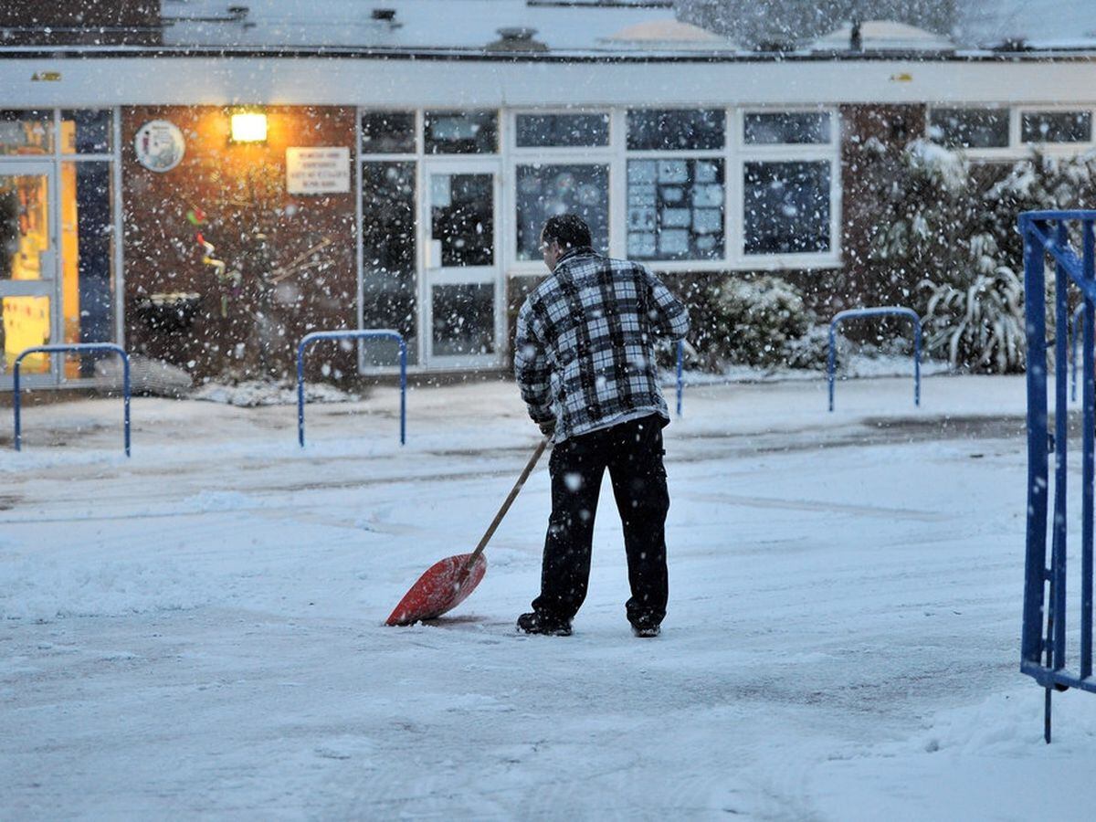 A file picture of a snow clean up at a school