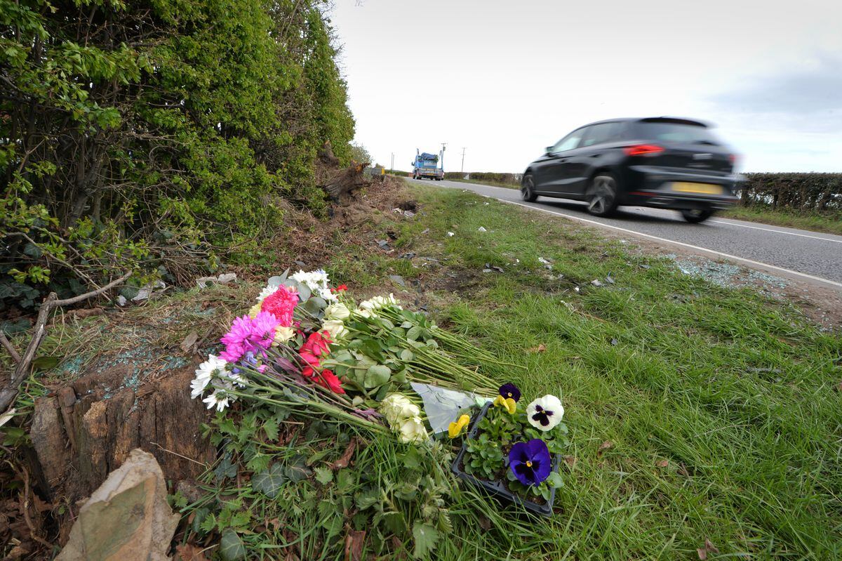 Flowers have been left at the scene of the fatal crash