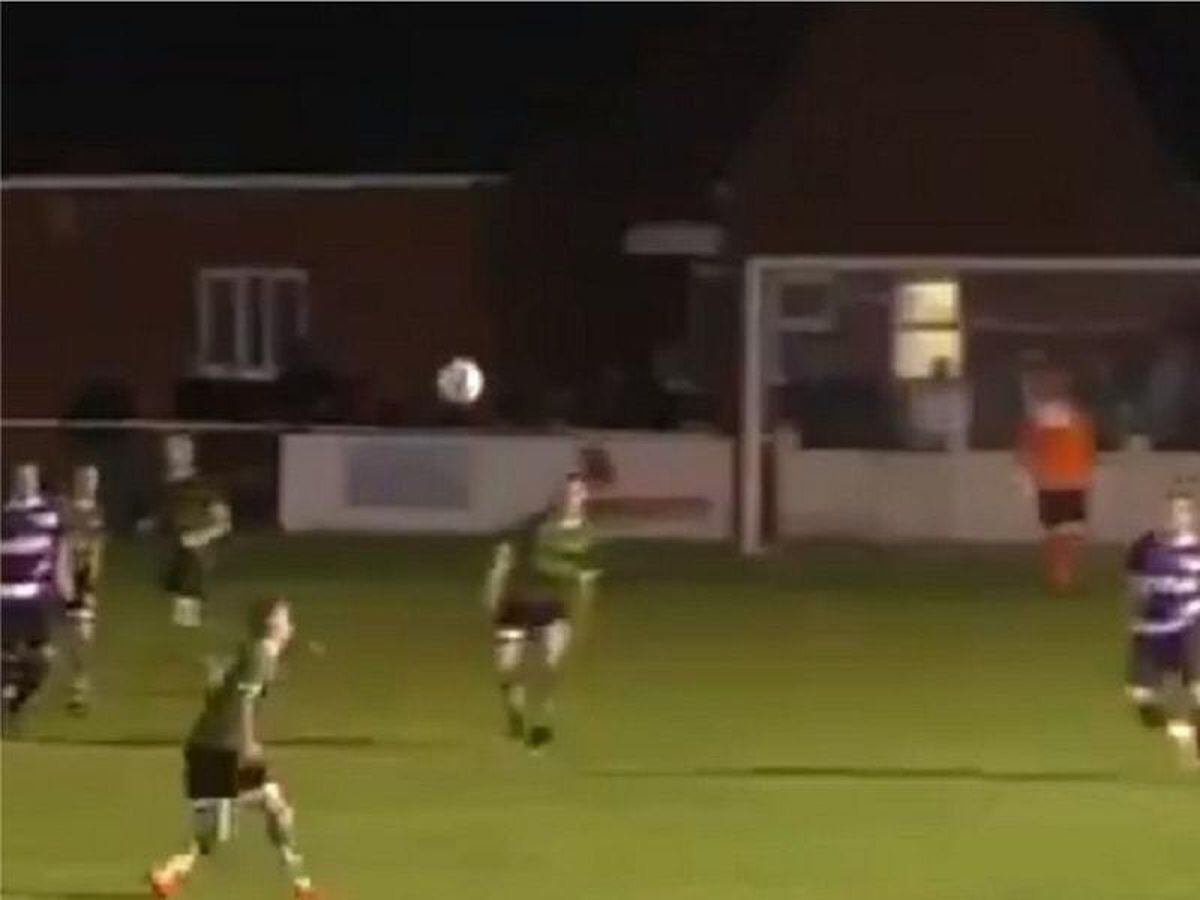 Jake Parker scores a volley for 1874 Northwich in a league game