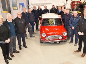 Unrivalled experience… Ann and Robin Hitch (extreme left) and their son Lee (right) with colleagues at Fix Auto Oswestry and Fix Auto Wrexham who’ve clocked up a staggering 450+ years between them.