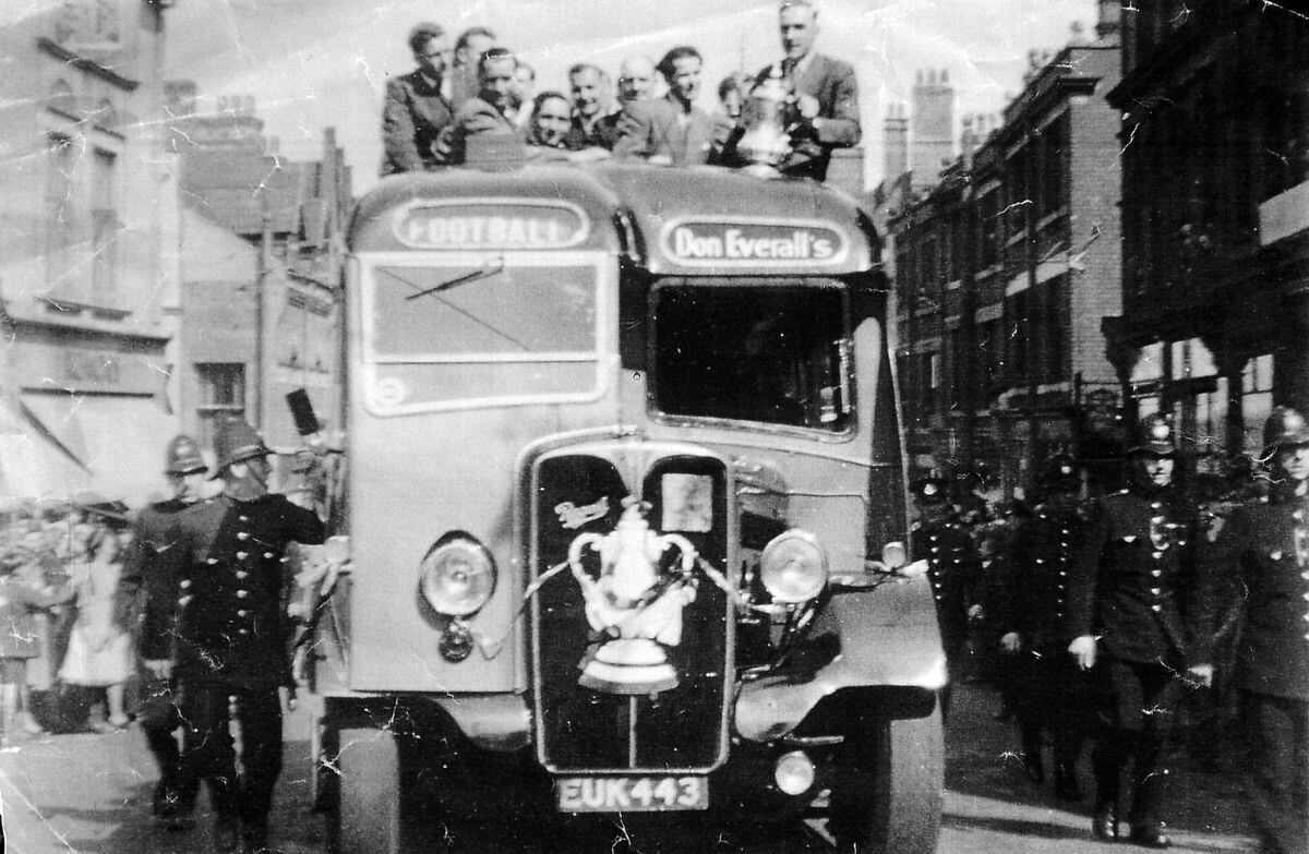 Billy holding the cup on the triumphant return to Wolverhampton after winning the 1949 FA Cup. Picture: Ken Clibery.