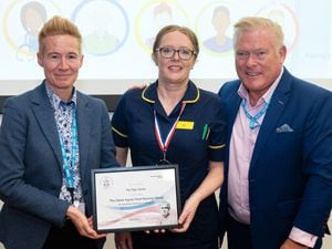Stacey Keegan, chief executive; and Harry Turner, chair; presenting Pip Page-Davies, oncology specialist nurse; with the Dame Agnes Hunt Nursing Medal.