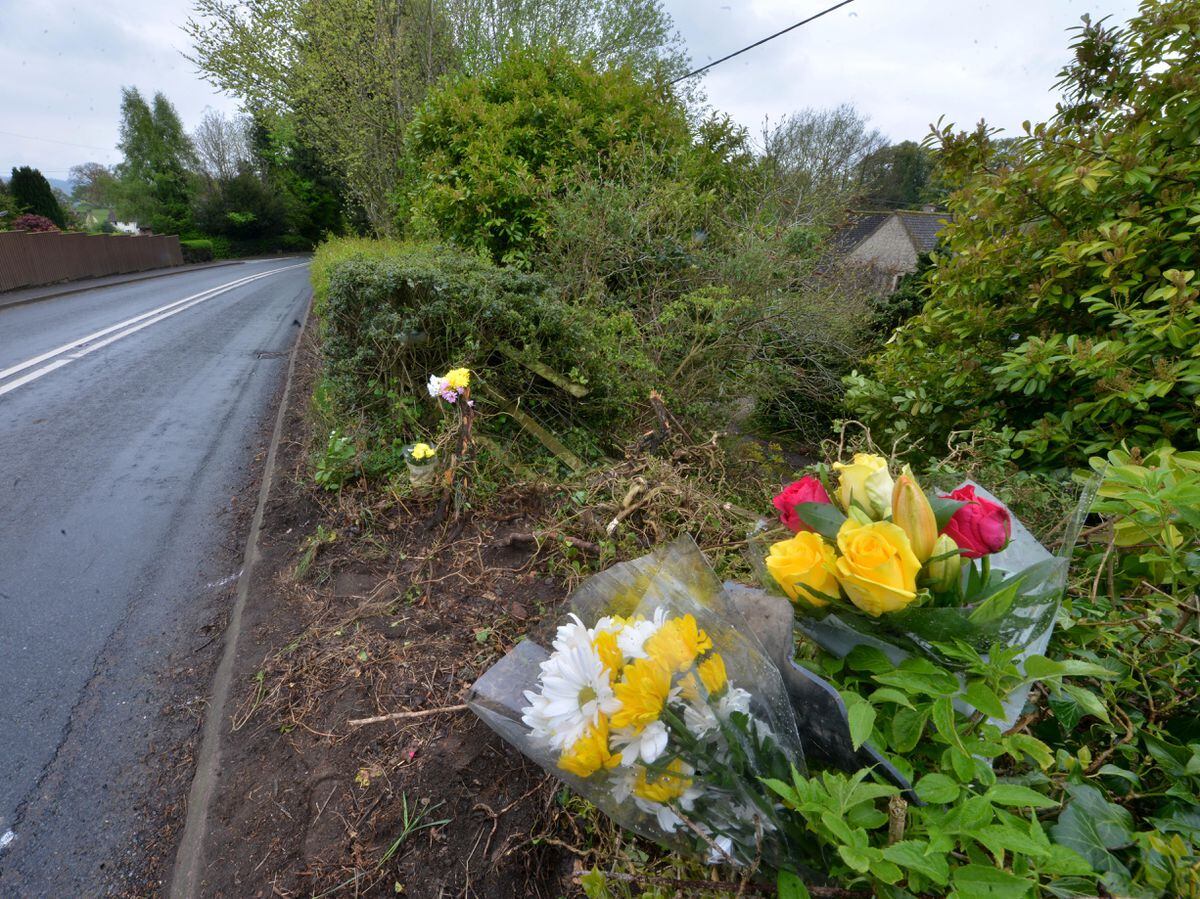 Floral tributes left at the side of the B4368 at Diddlebury