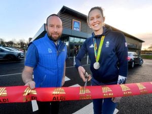 Store manager Robert Birch with Olympian Victoria Thornley at the opening of the new Aldi